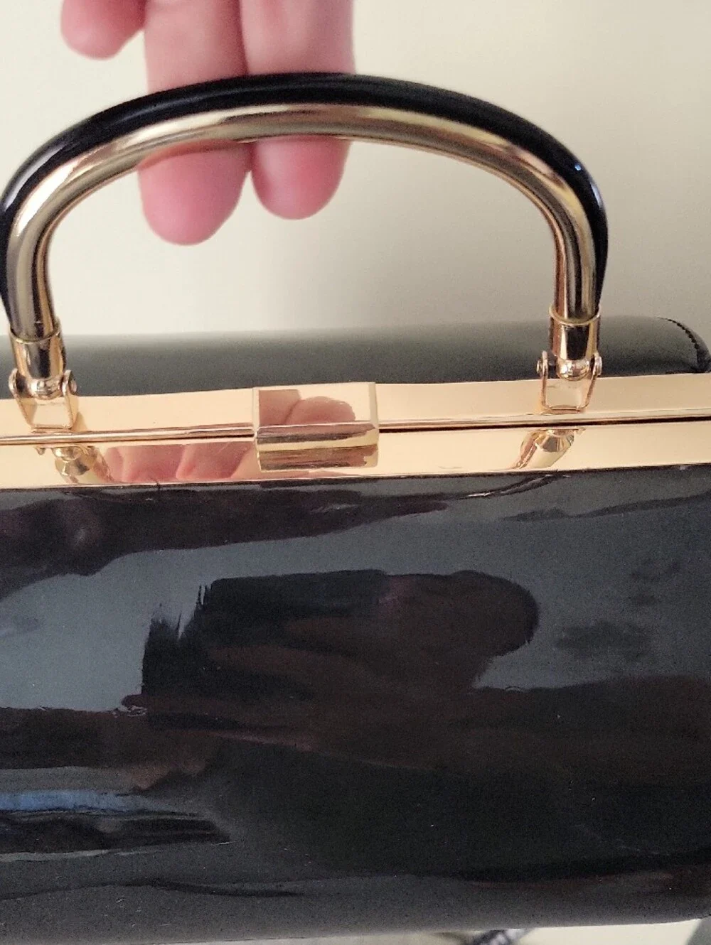 Vintage Sleek Black Patent Barrel Crossbody Bag with Gold Hardware